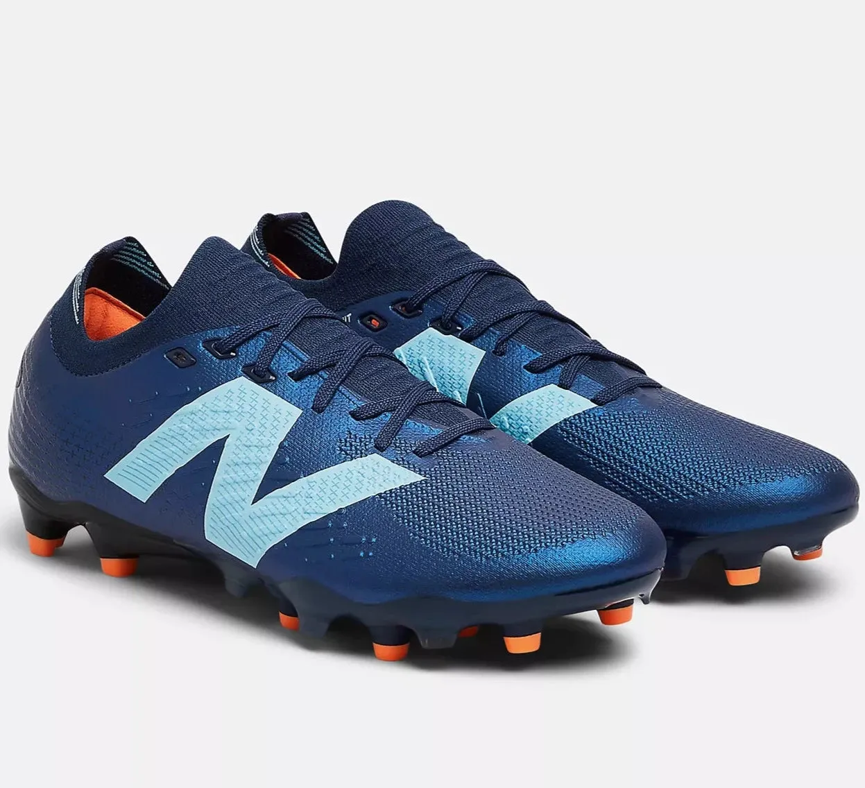 NEW BALANCE TEKELA PRO LOW FG V4  FOOTBALL BOOTS